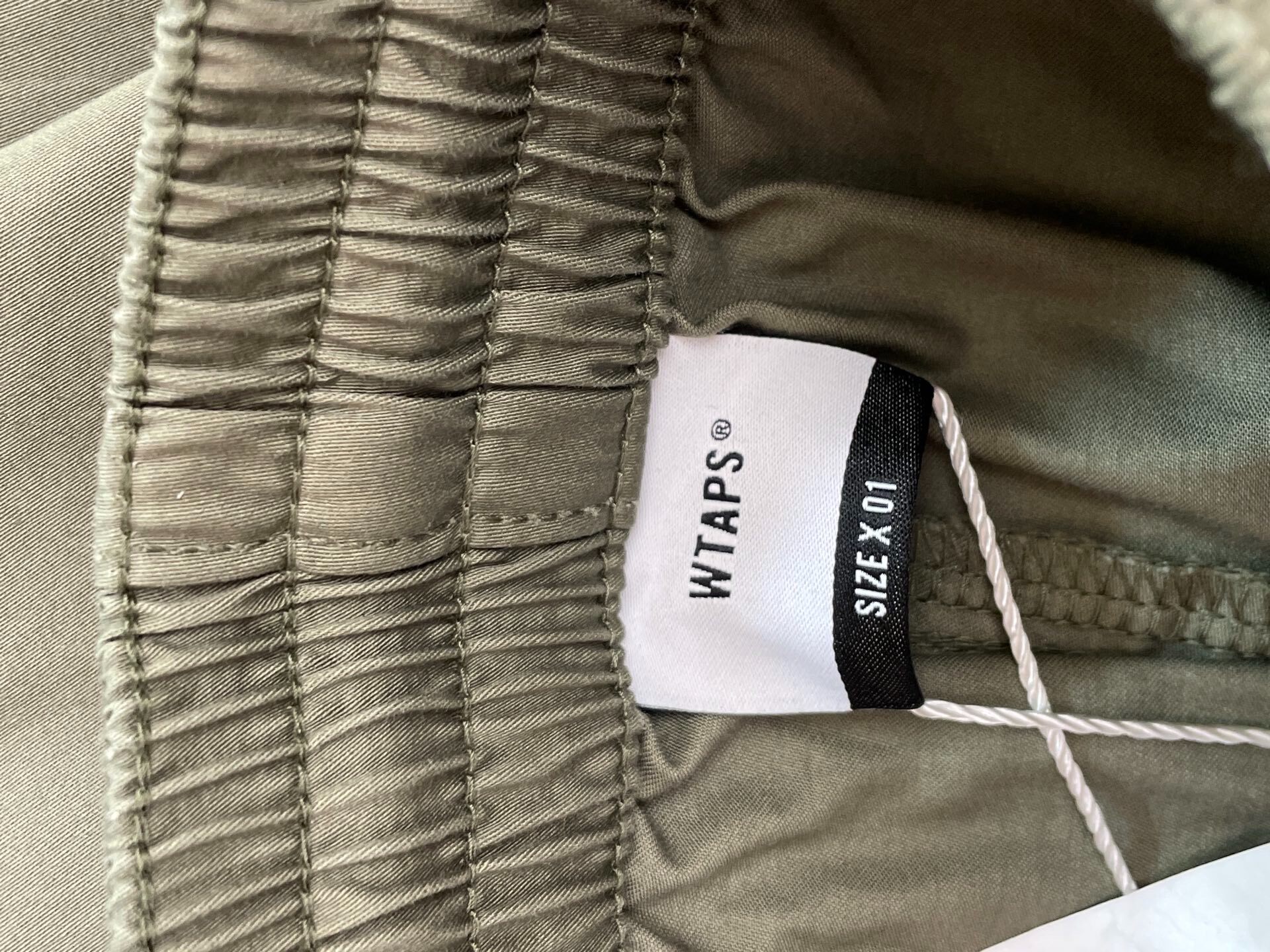 WTAPS Olive Green Jogger Pants — detail