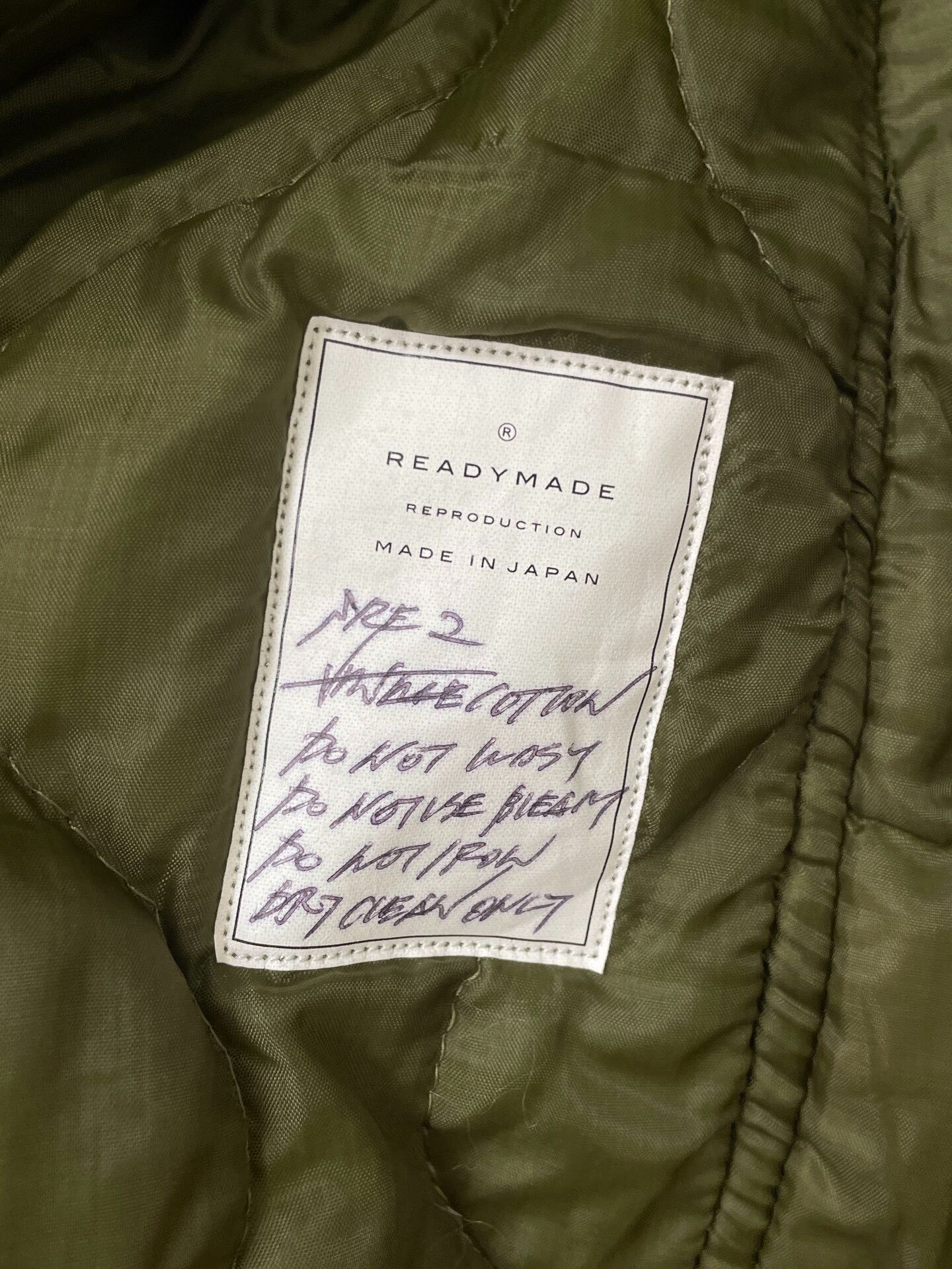 Readymade Olive Fishtail Parka — label