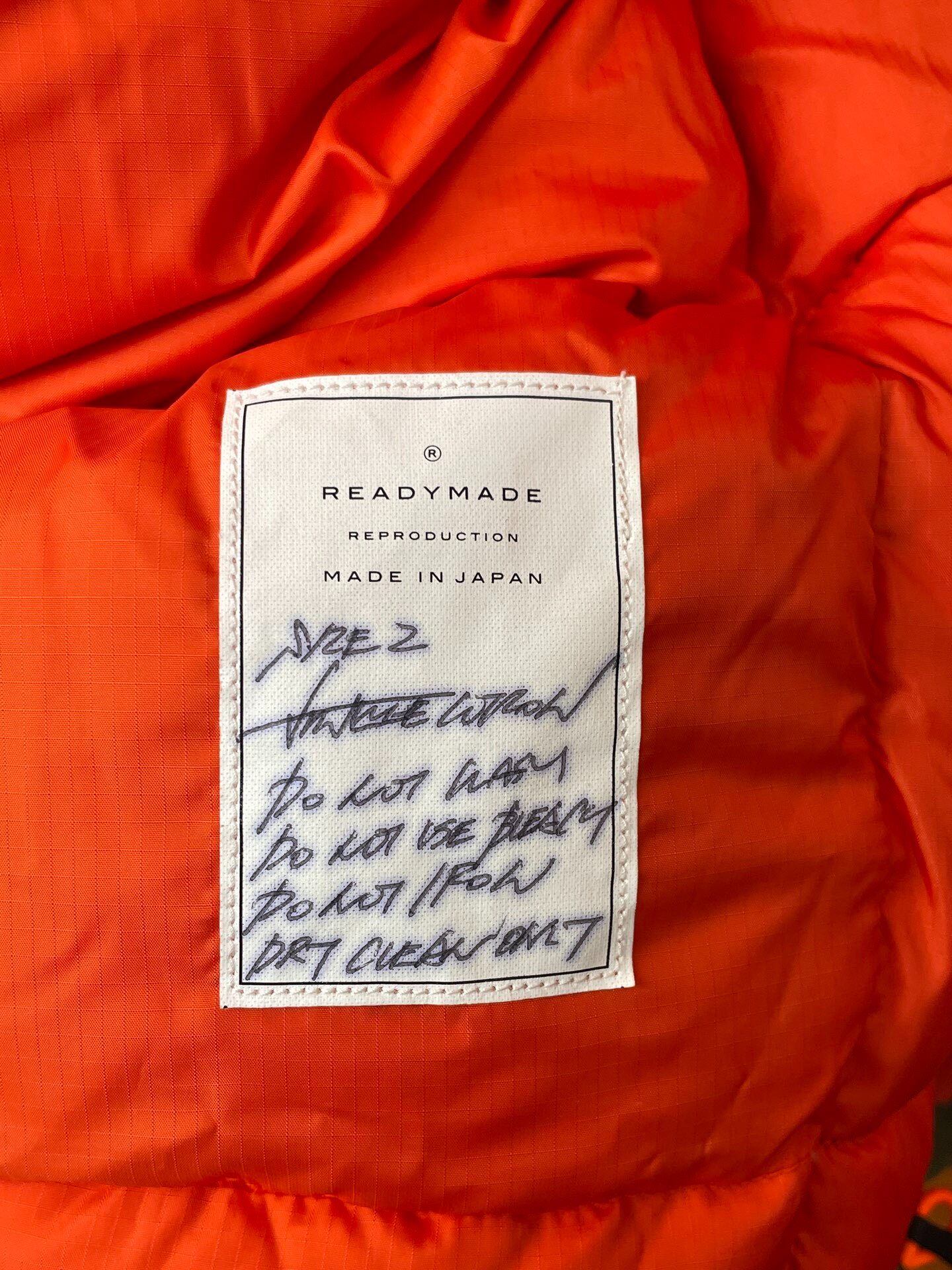 Readymade Olive Green Down Jacket — label