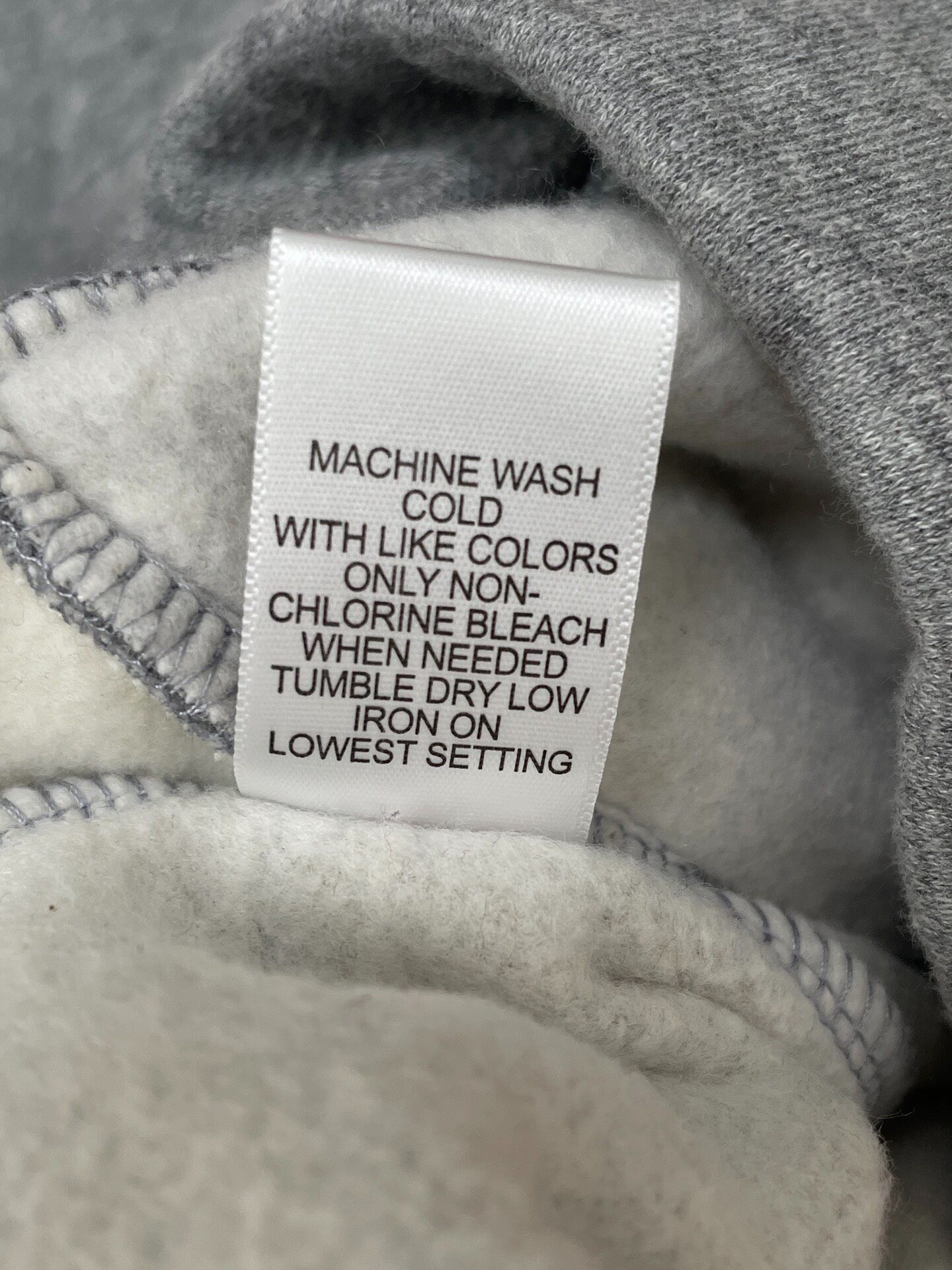 Fear of God Essentials Striped Sweatpants — label