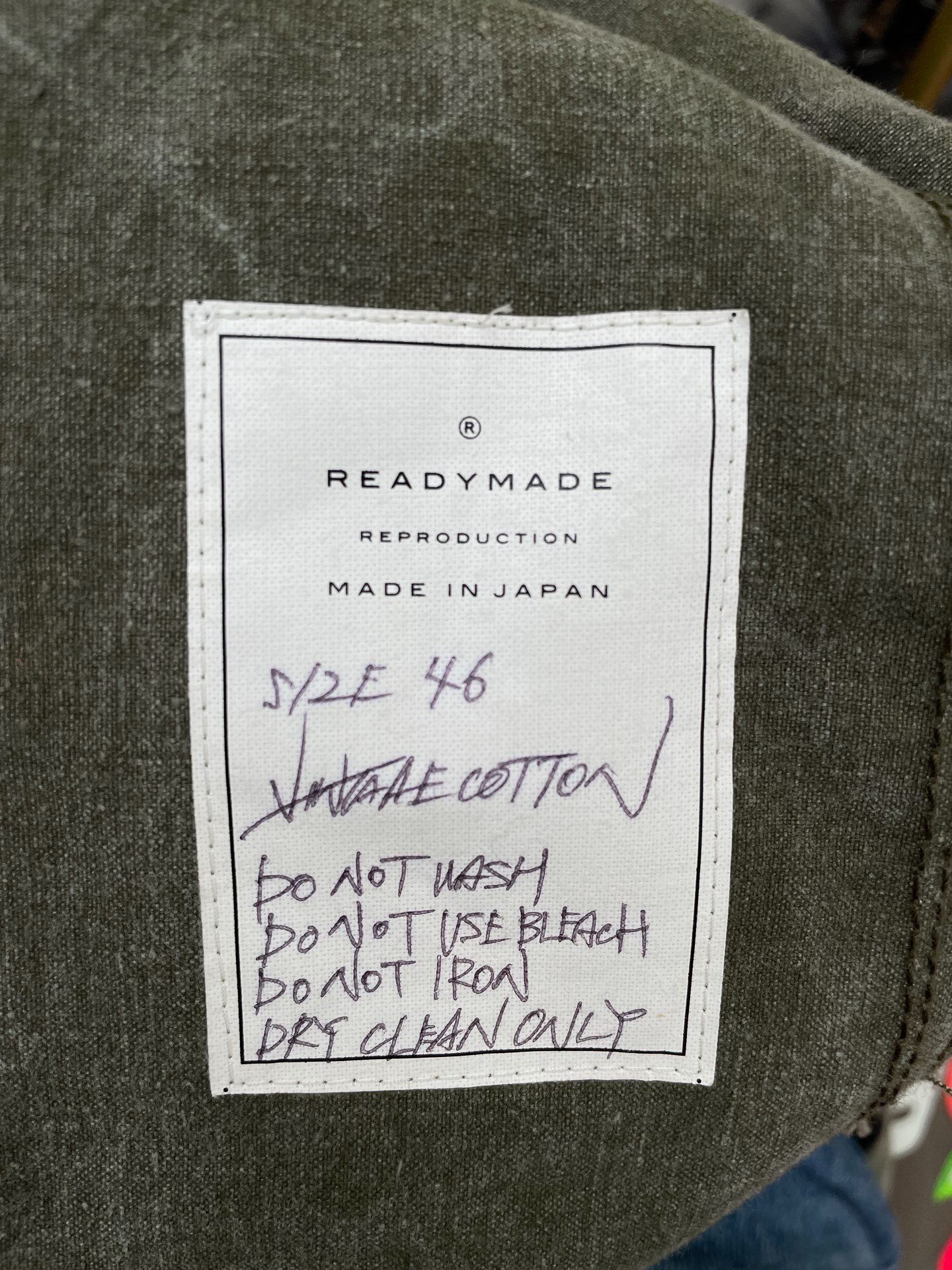 Olive Camouflage Jacket With Patches — label