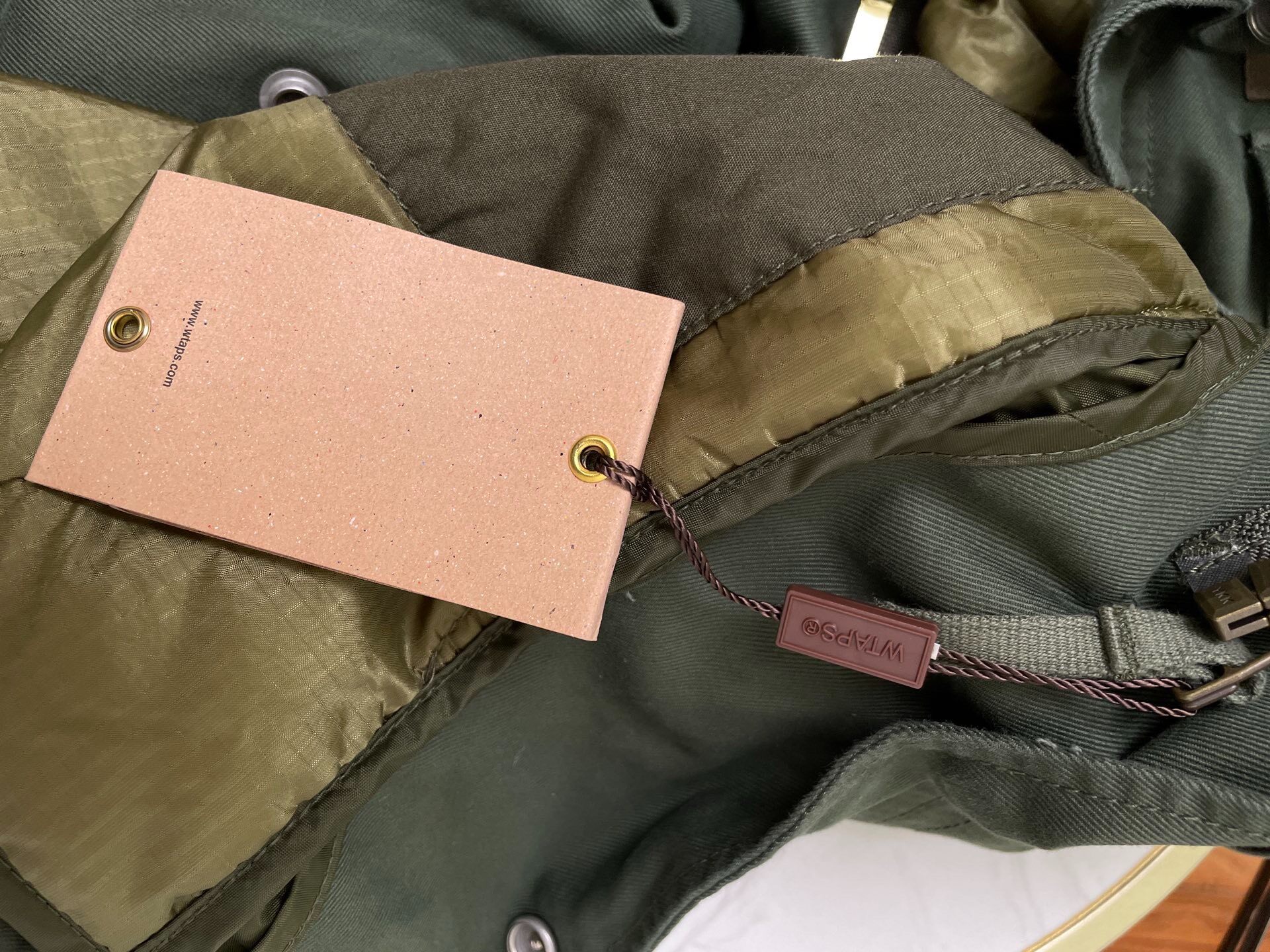 WTAPS Olive Green Field Jacket — label