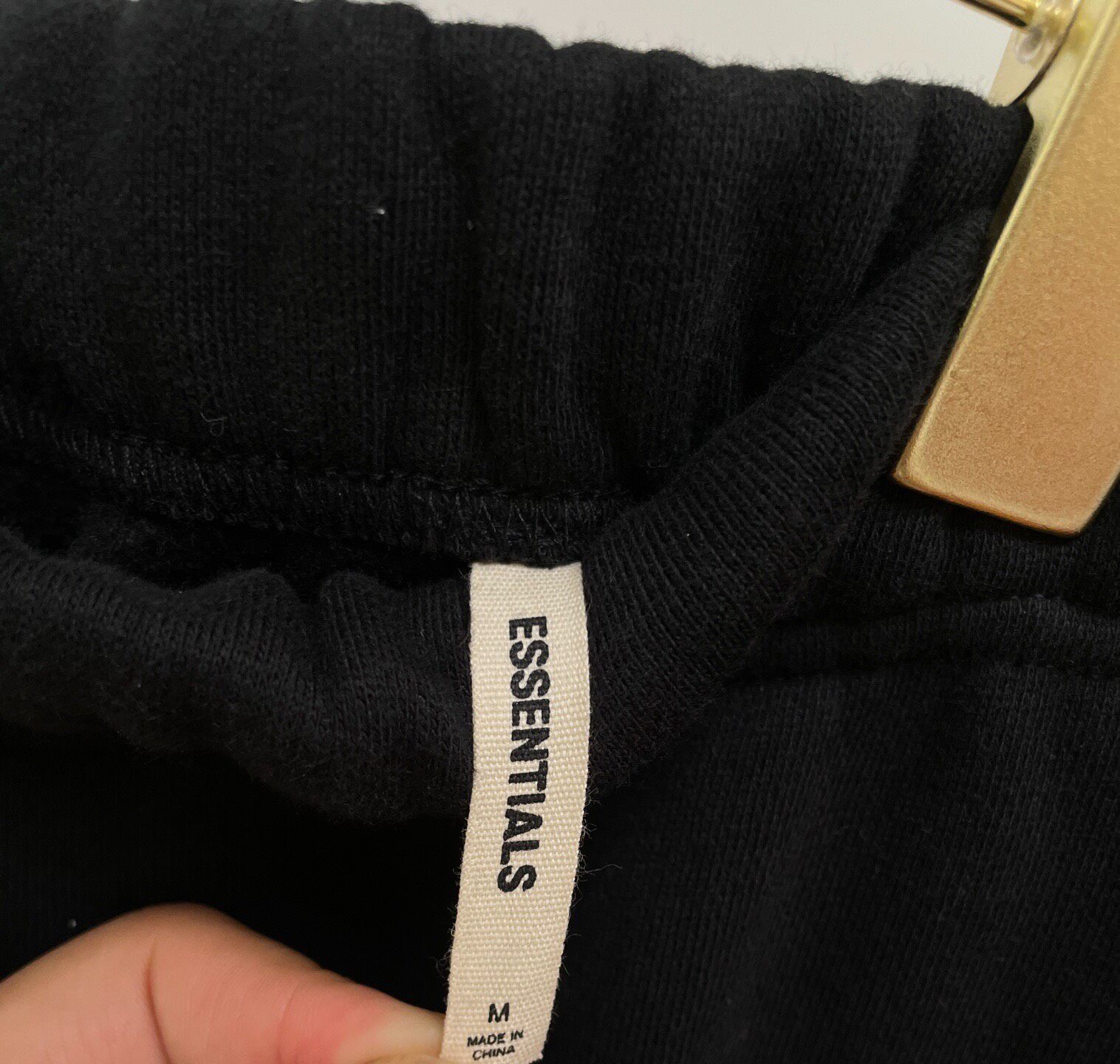 Fear Of God Essentials Black Sweatpants — label