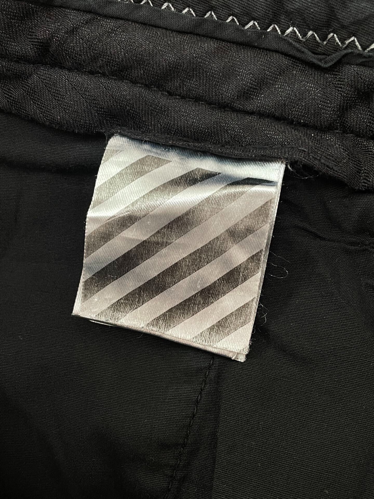 Off-White Distressed Slogan Pants — back
