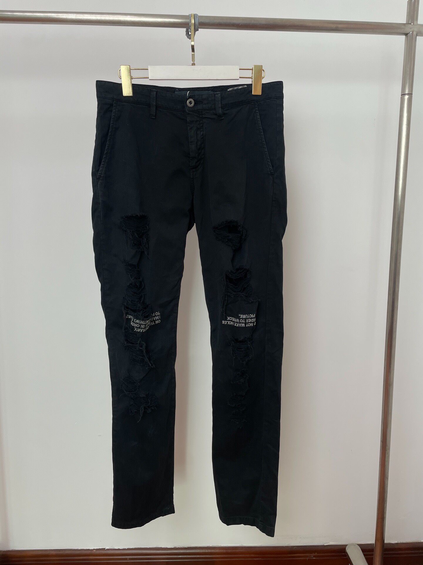 Off-White Distressed Slogan Pants