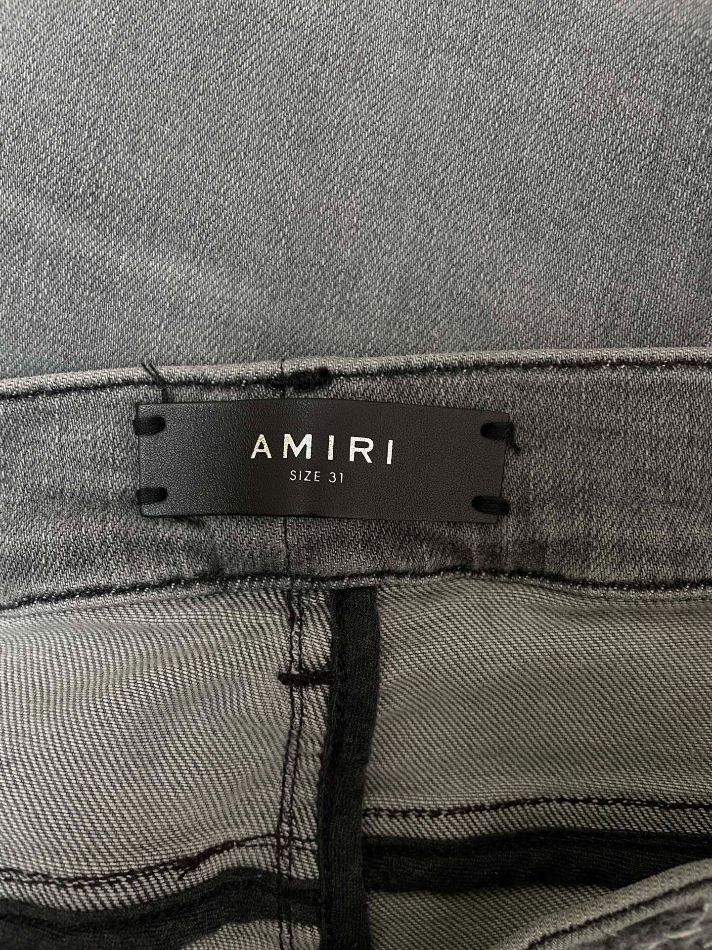 Amiri Gray Patchwork Distressed Jeans — detail