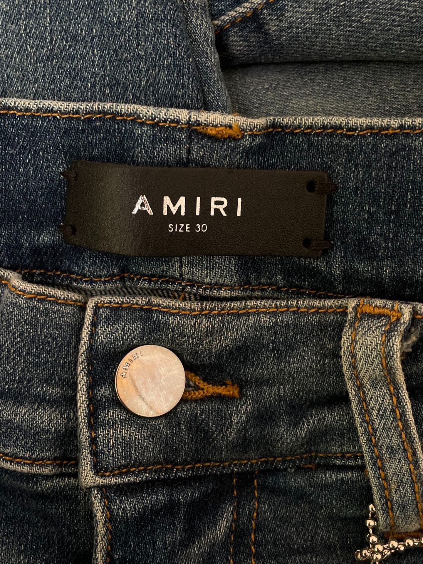 Amiri Blue Distressed Skinny Jeans — detail