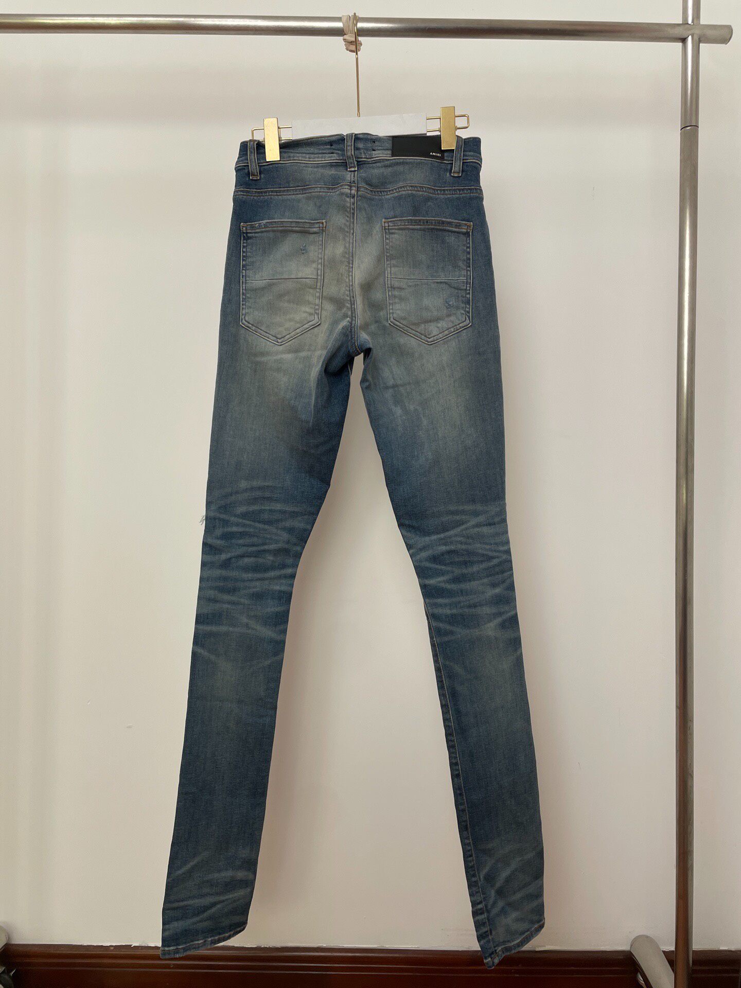 Amiri Blue Distressed Skinny Jeans — front