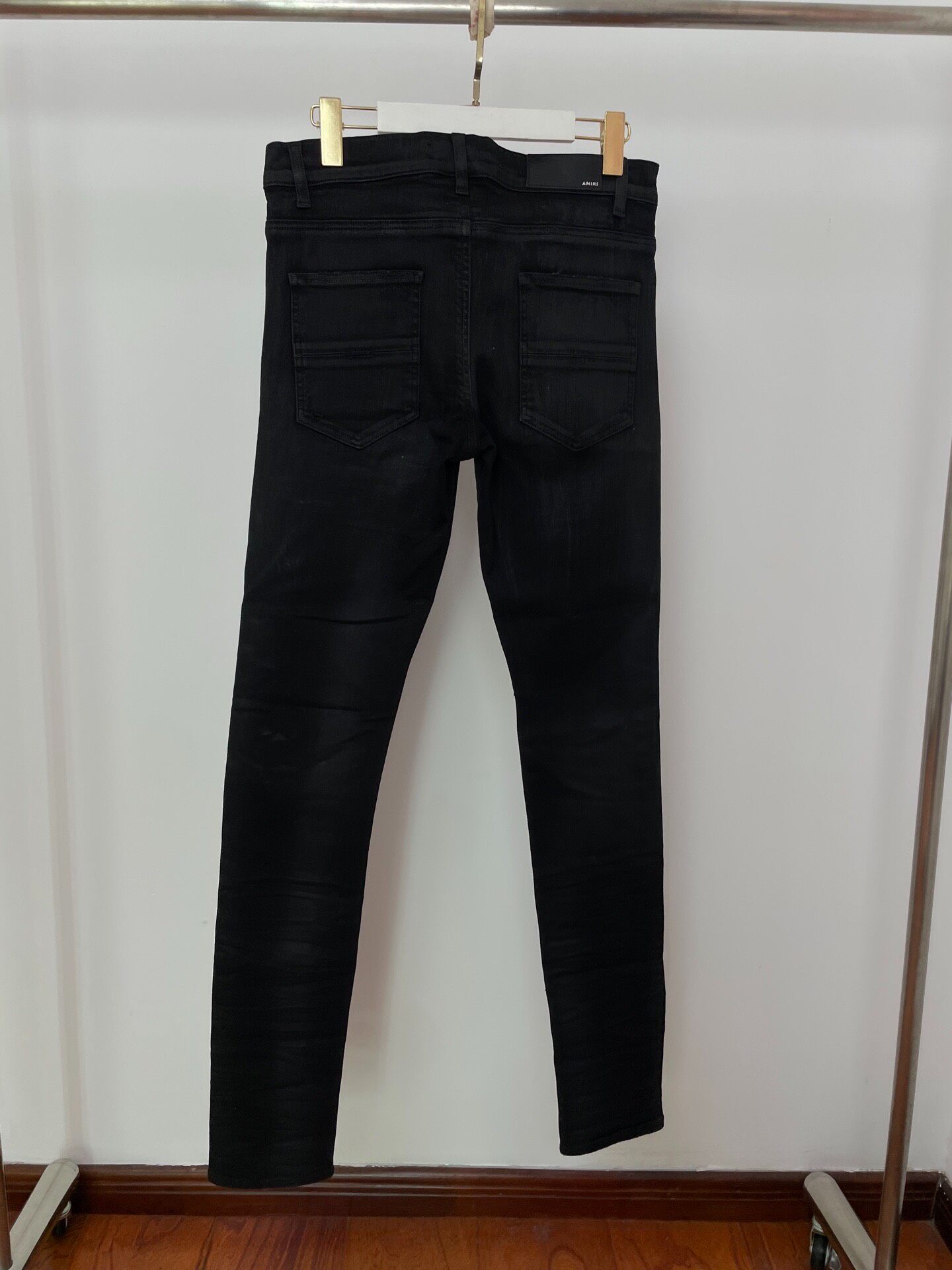 Amiri Straight Leather Patch Distressed Jeans — front