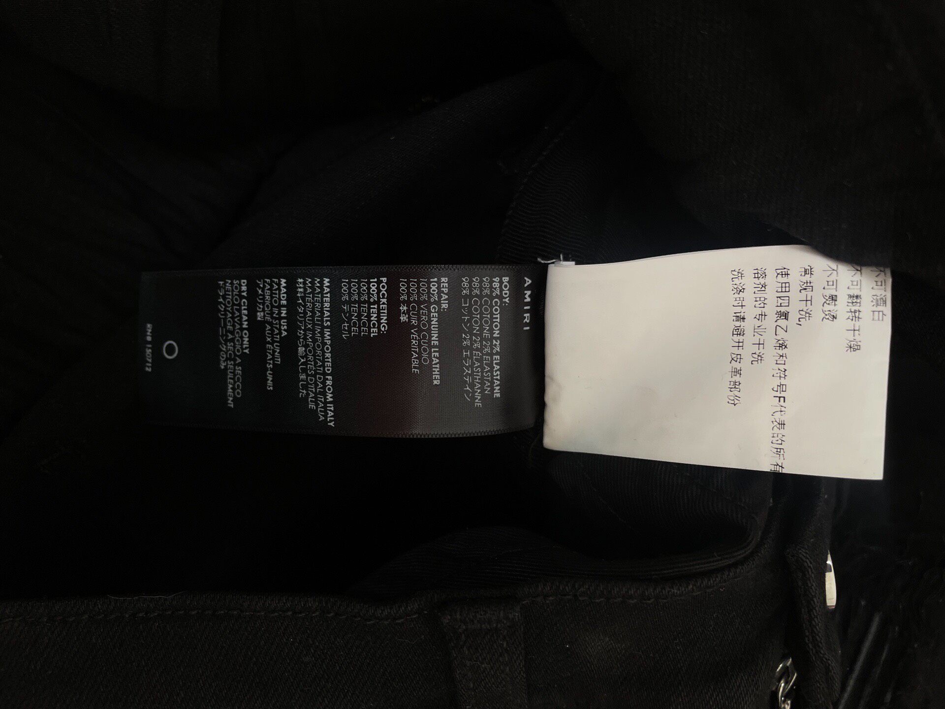 Amiri Black Distressed New Jeans — label