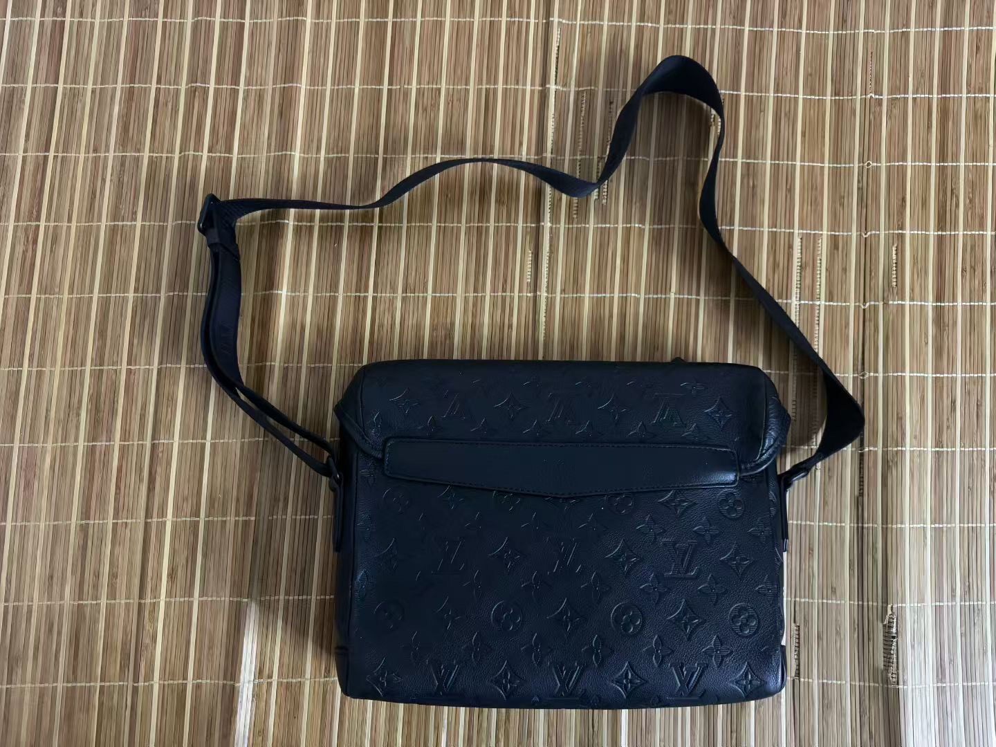 Louis Vuitton Black Embossed Messenger Bag — front