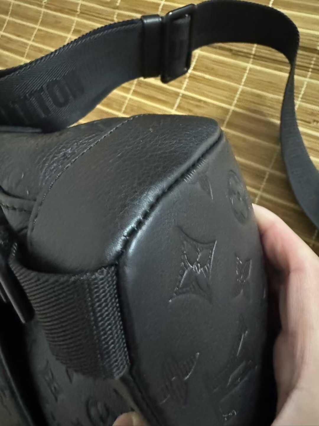 Louis Vuitton Black Embossed Messenger Bag — label