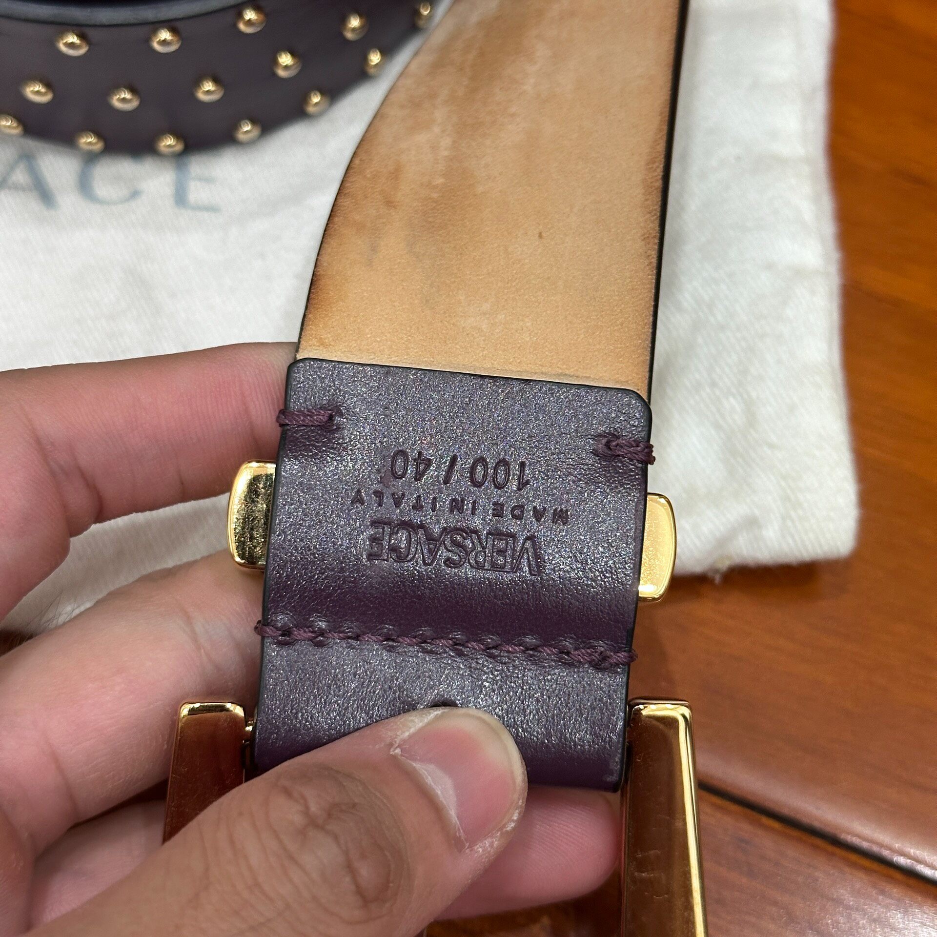 Versace Medusa Gold Stud Leather Belt — detail