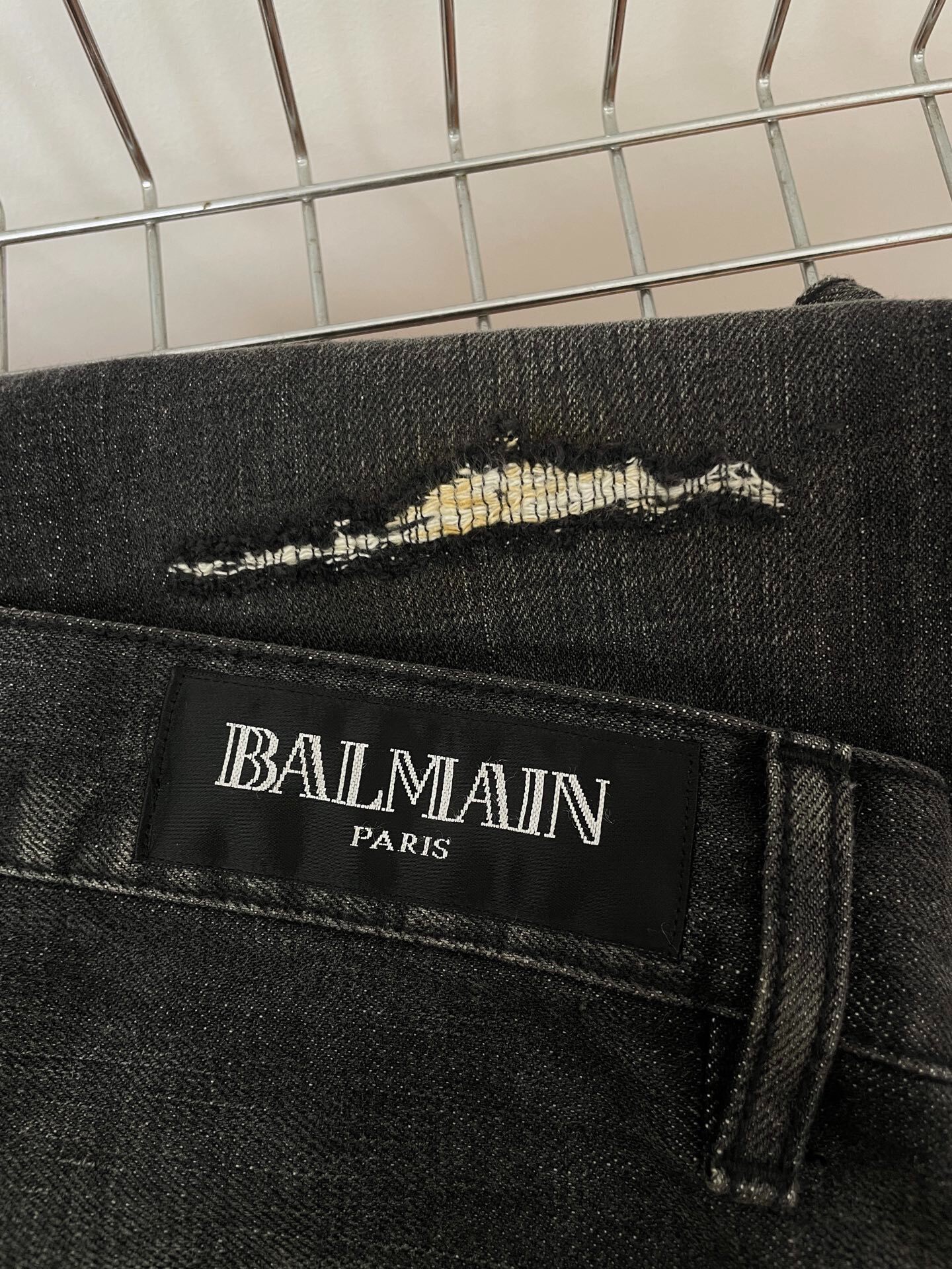 Balmain Distressed Denim Jeans — detail