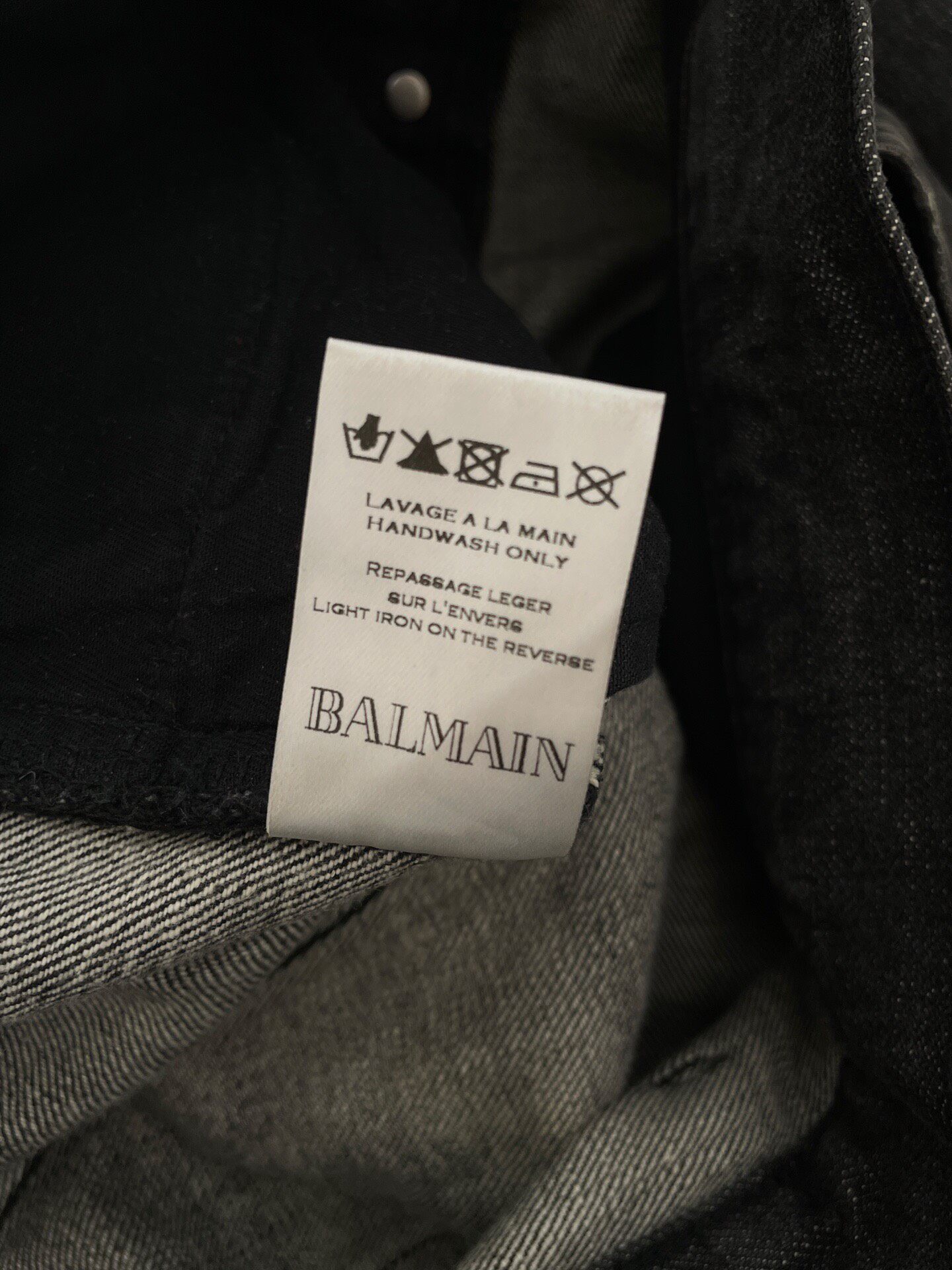 Balmain Distressed Straight Jeans — label