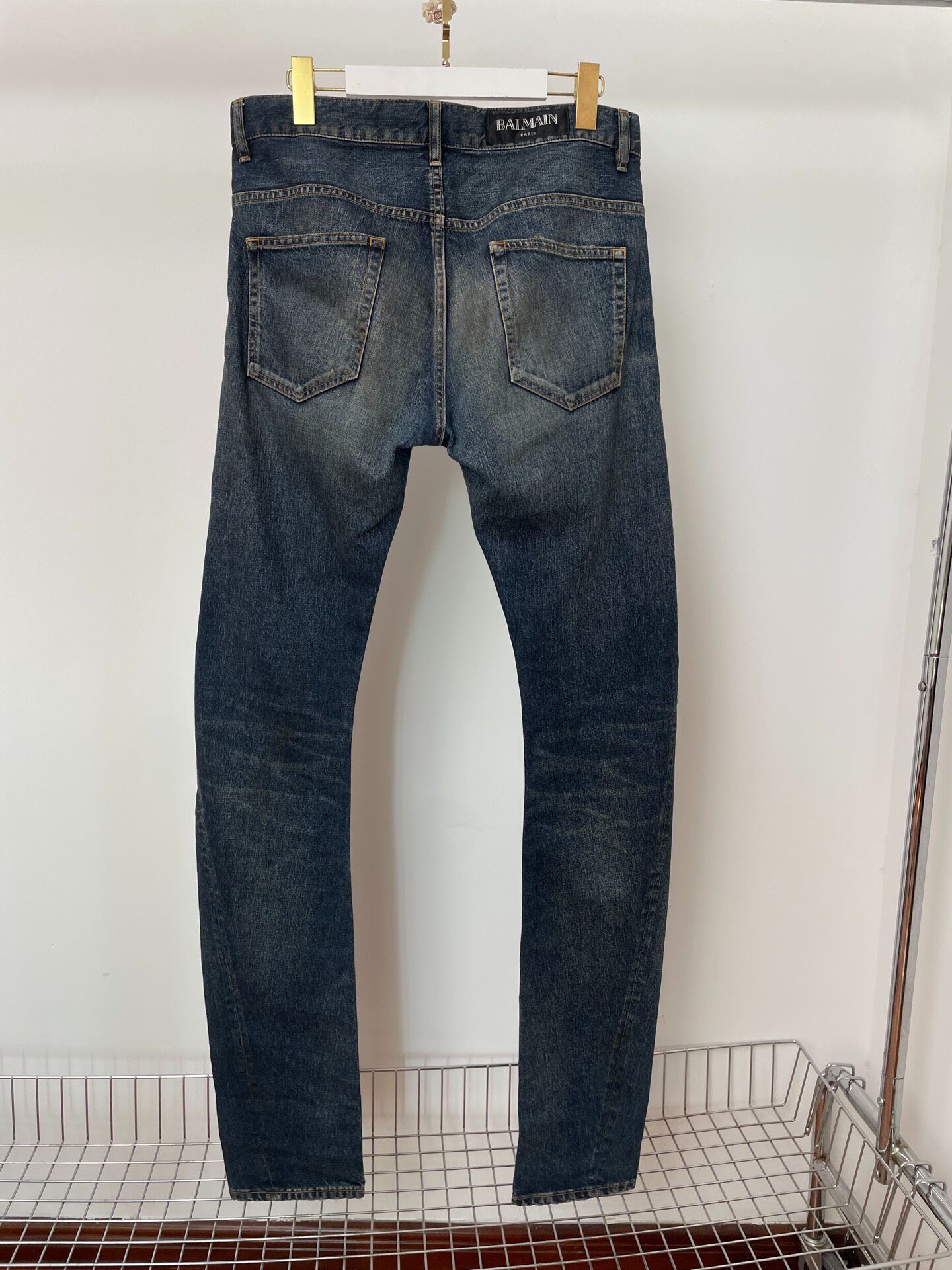 Balmain Curved Cut Denim Jeans — front