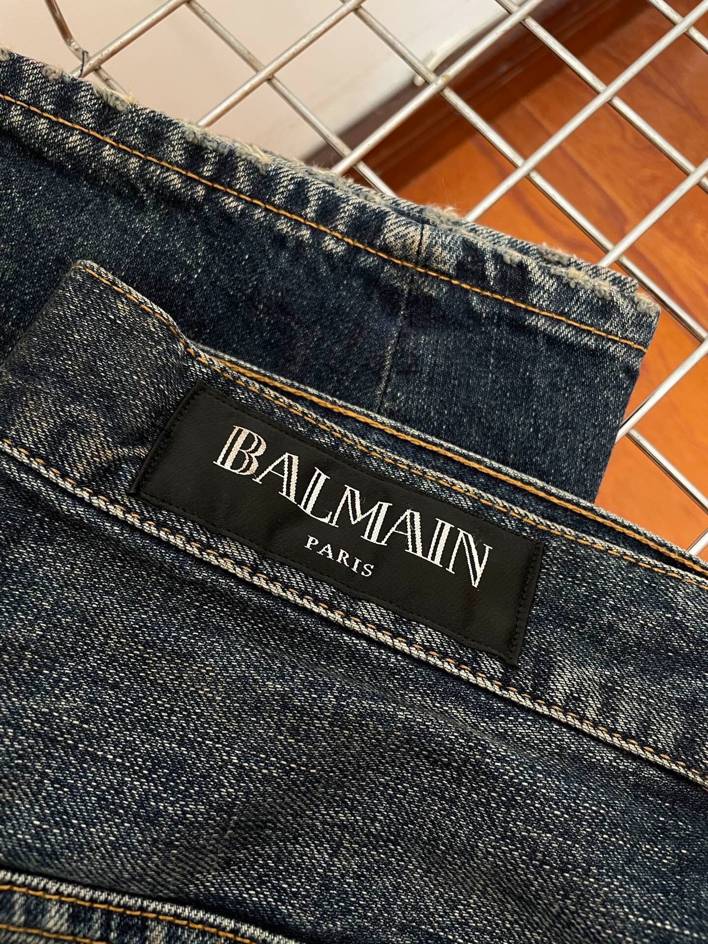 Balmain Curved Cut Denim Jeans — detail