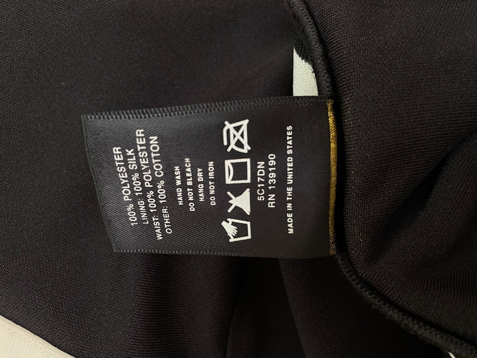 Fear of God Fifth Season Track Pants — label