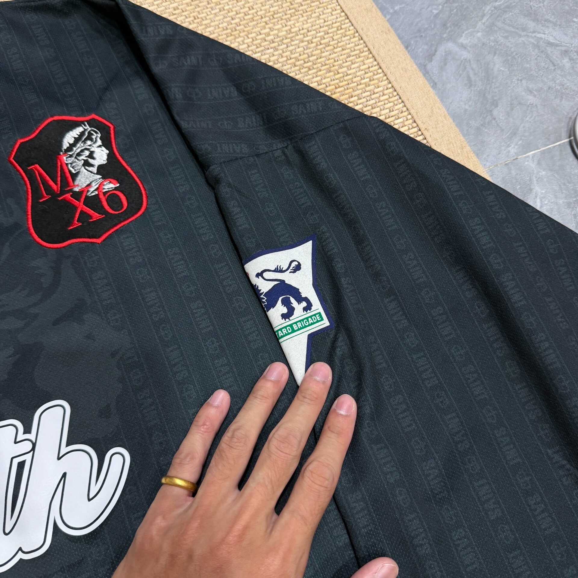 Saint Michael Faith Football Jersey — label