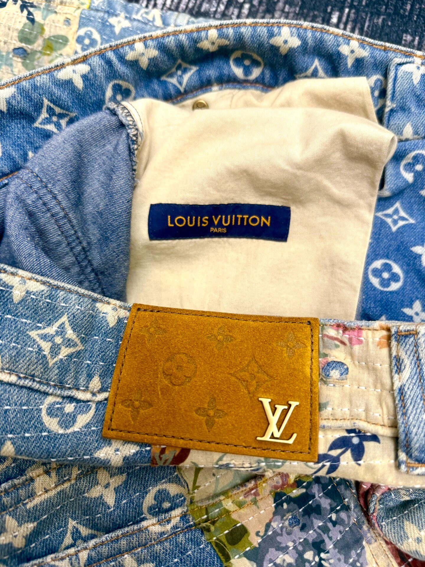 LV 22FW Floral Distressed Flared Jeans — label