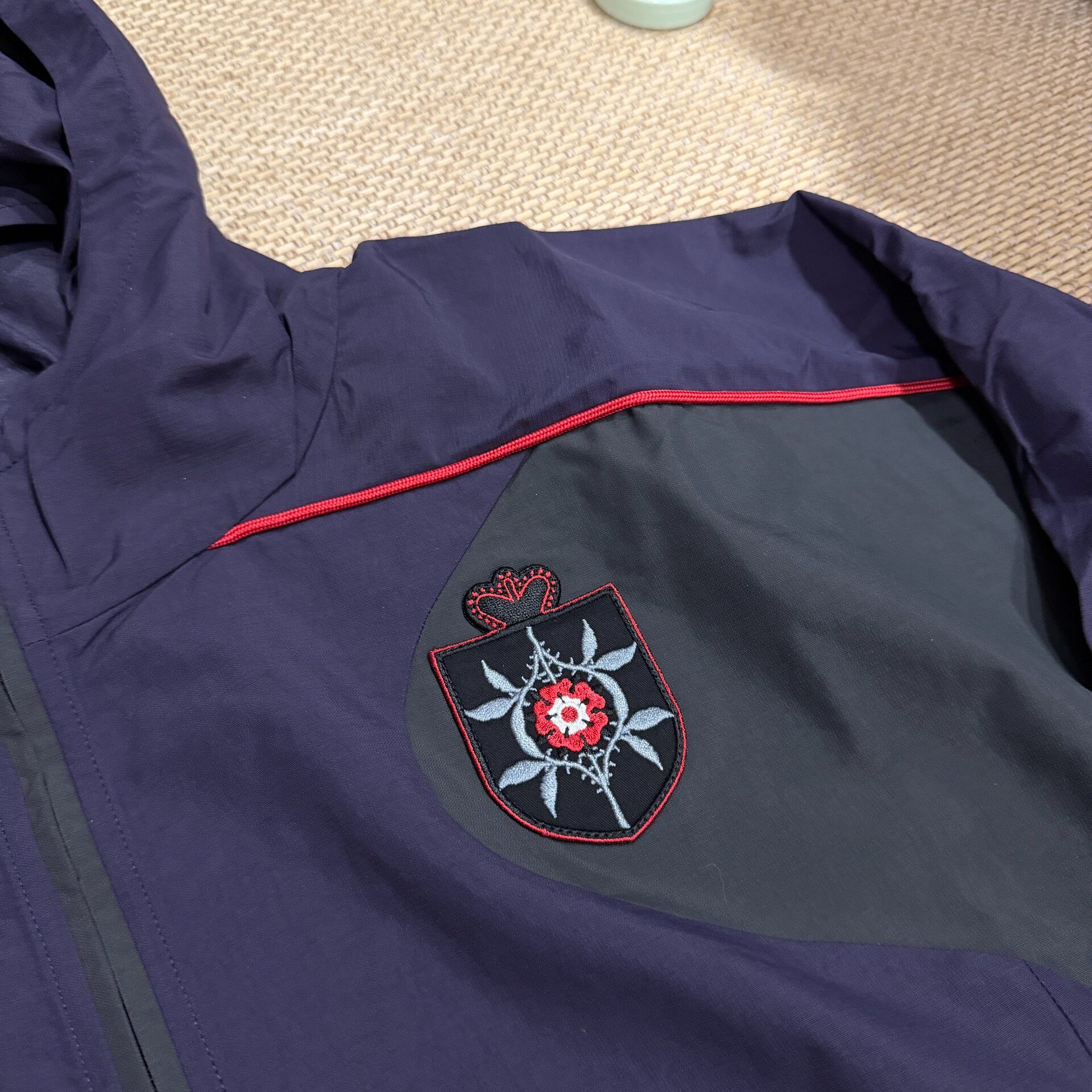 Slam Jam x Umbro Rose Crest Track Jacket — detail