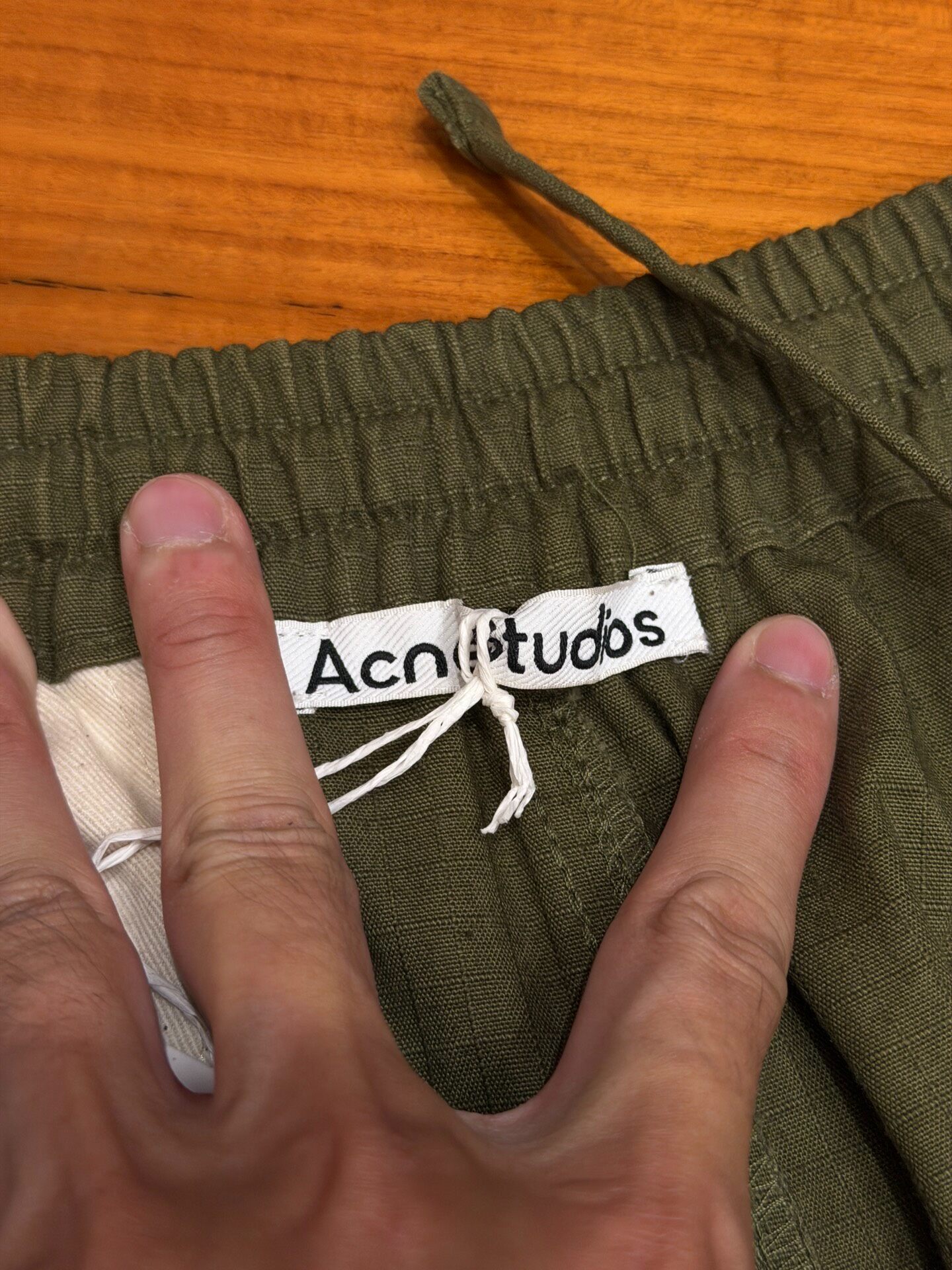 Acne Studio Olive Green Cargo Pants — label