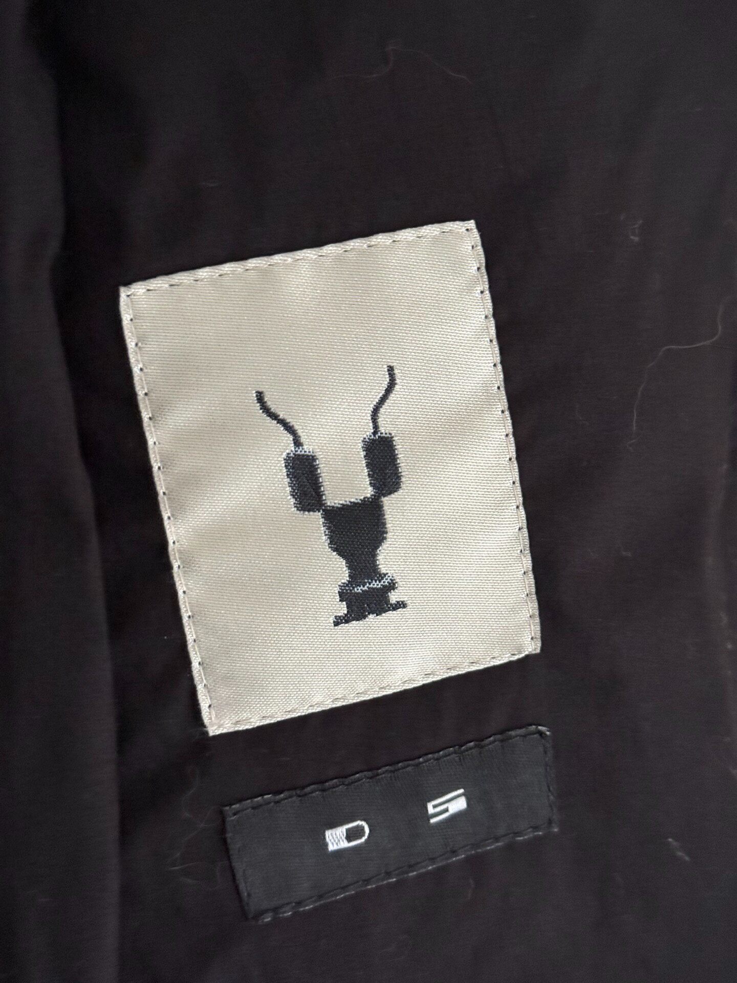 Rick Owens DRKSHDW Fishtail Padded Coat — label