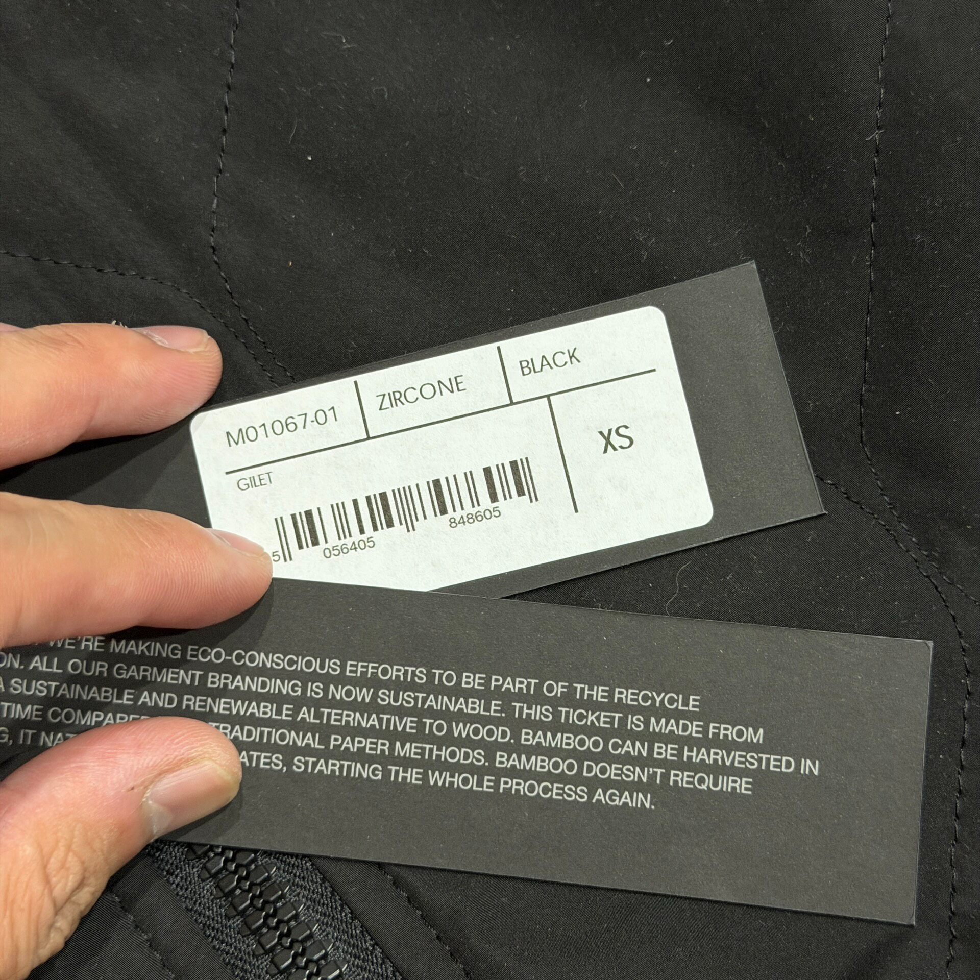 Black Quilted Lightweight Down Vest — label