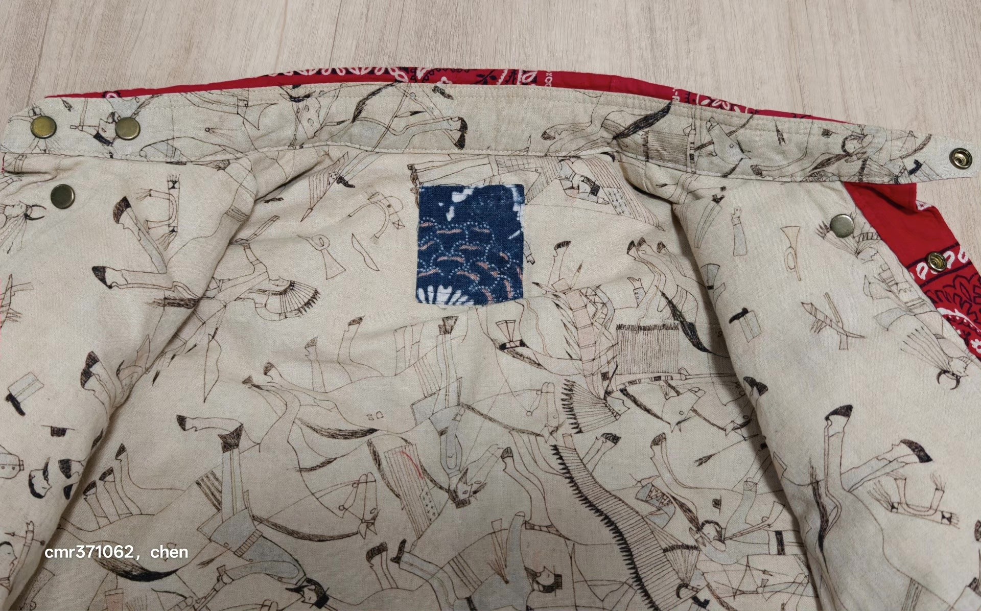 Visvim 12 ICT Paisley Down Jacket — label