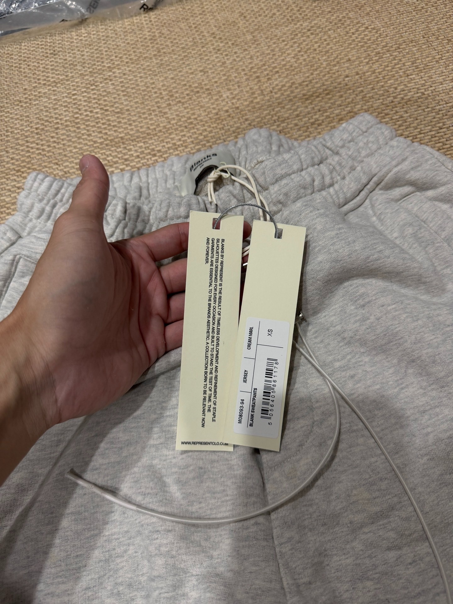 Oatmeal Gray Embroidered Drawstring Sweatpants — label