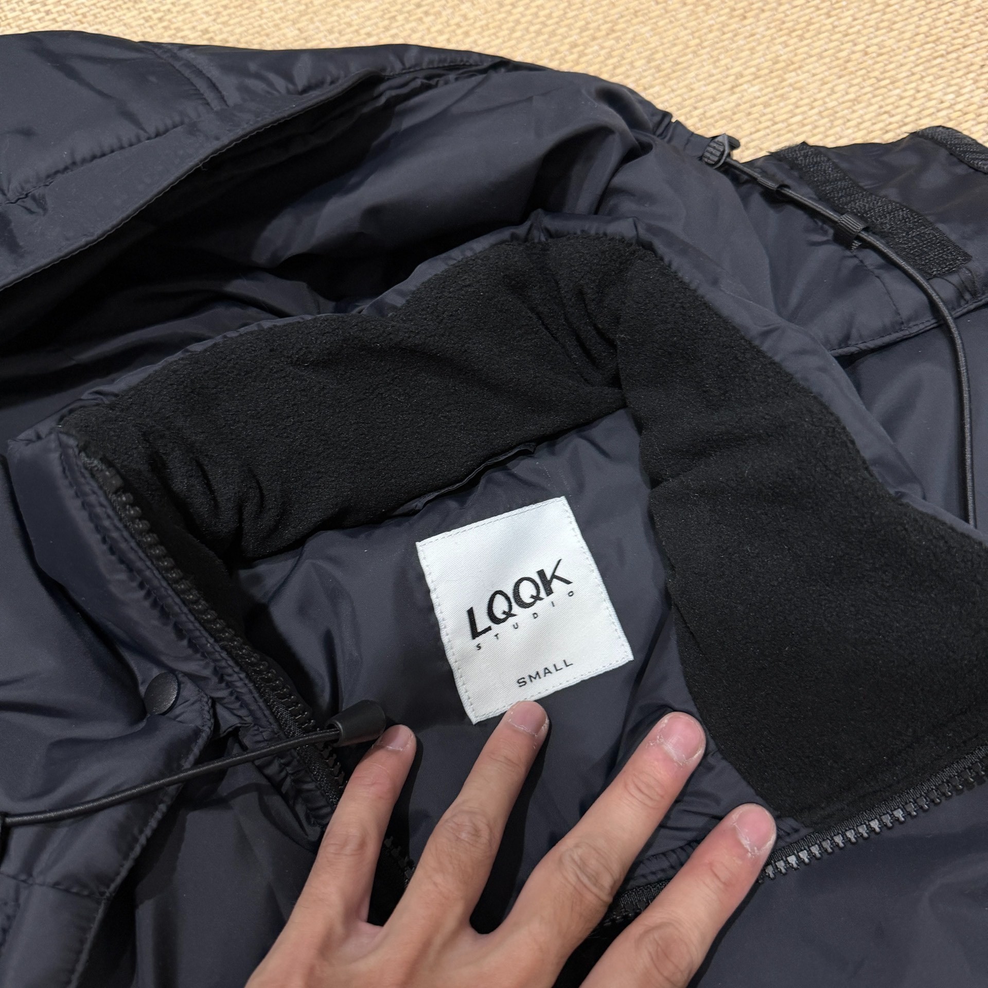 LQQK Lightweight Padded Jacket — label